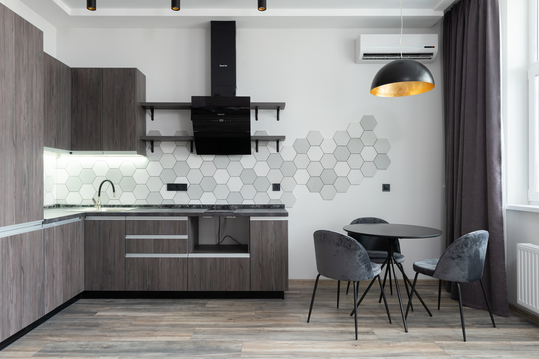Contemporary kitchen interior with furniture in house